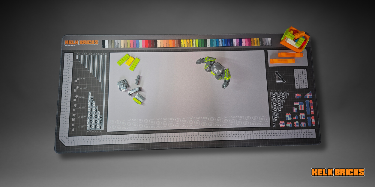 Premium desk mat for LEGO® building, featuring a stud ruler, color chart, and a guide for advanced techniques.