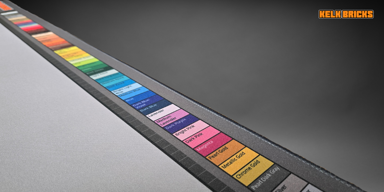 Premium desk mat for LEGO® building, featuring a stud ruler, color chart, and a guide for advanced techniques.