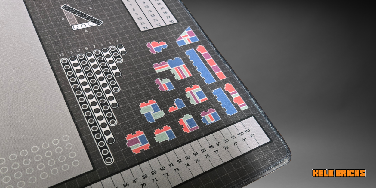 Premium desk mat for LEGO® building, featuring a stud ruler, color chart, and a guide for advanced techniques.