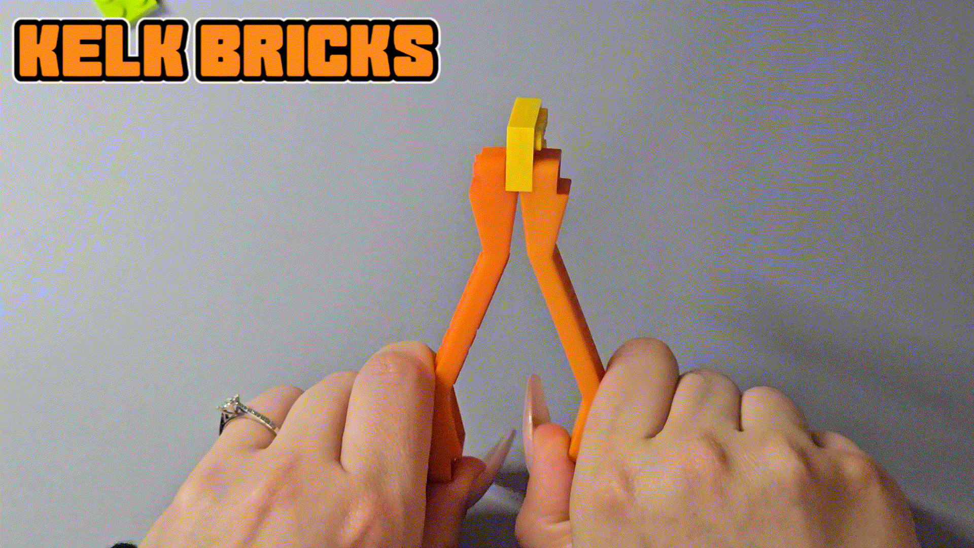 Ergonomic custom brick separator for removing hard-to-reach LEGO® pieces without damage.